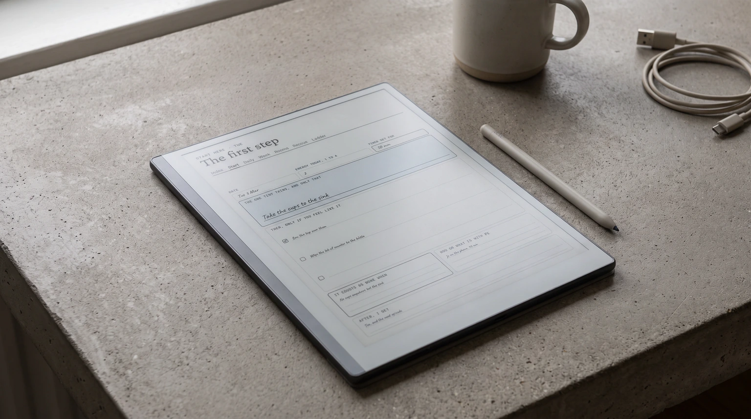 A first-step page from our ADHD Cleaning Planner on an e-ink tablet, holding one task and nothing else