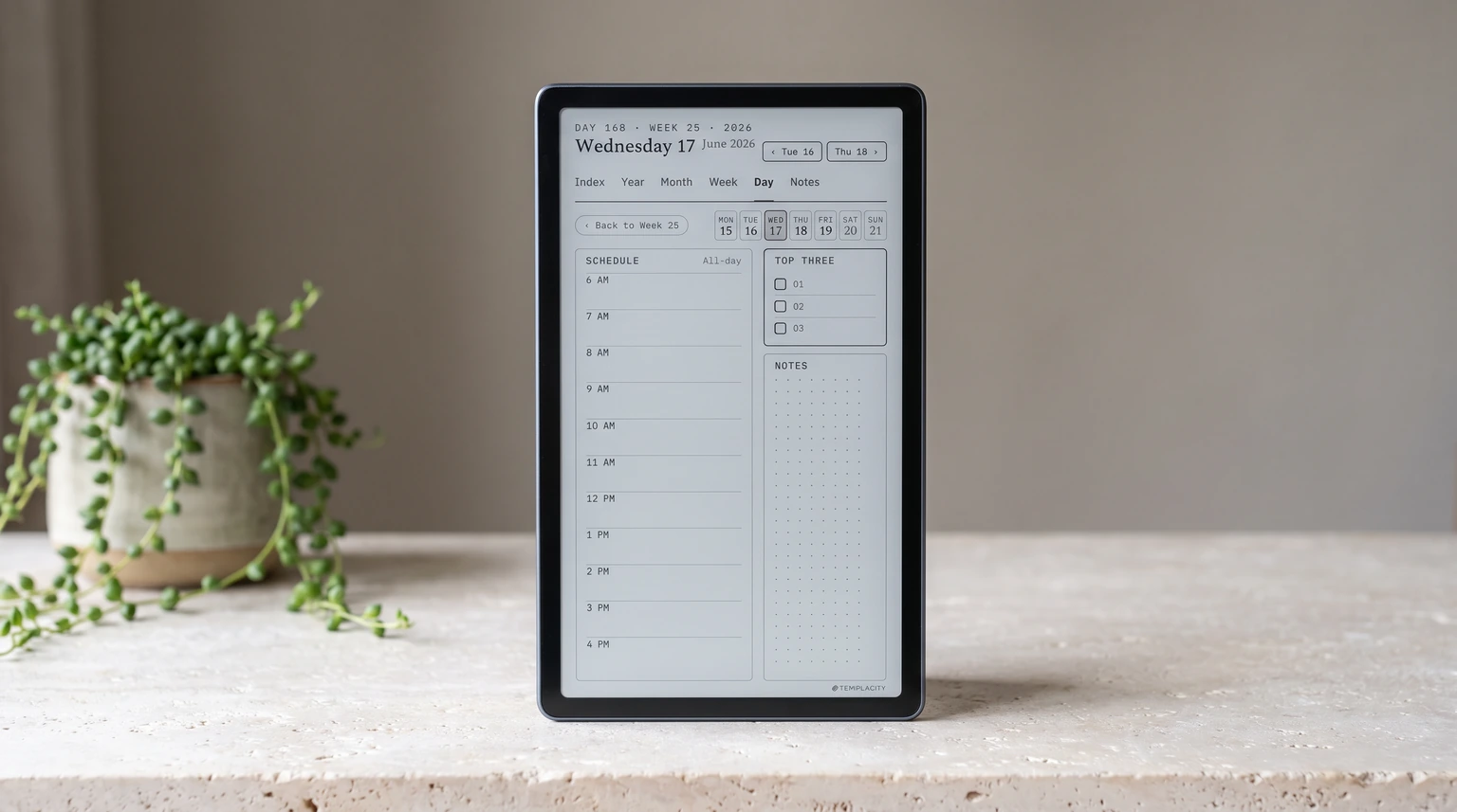 A reMarkable Paper Pro Move standing on a counter, its tall screen showing a filled day page