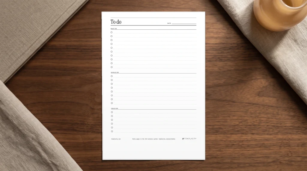 Our free printable to do checklist on a desk: must do, should do and could do lists with tick boxes, printed on US Letter